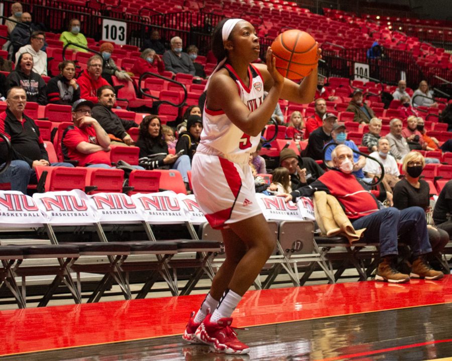 Senior guard Nia Ahart shoots the ball during a Feb. 24 game against Eastern Michigan University at the NIU Convocation Center.