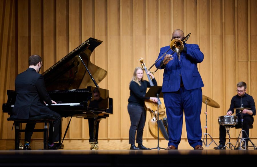 Austyn Menk (from left) plays piano, Morgan Turner plays string bass, Kirby Fellis plays trombone and Noah Brooks plays drums in a jazz quartet (Zohair Khan | Northern Star)