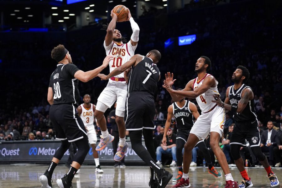 Cleveland Cavaliers Darius Garland goes up for a shot during the first half against the Brooklyn Nets in the opening basketball game of the NBA play-in tournament Tuesday, April 12, 2022, in New York. (AP Photo/Seth Wenig)