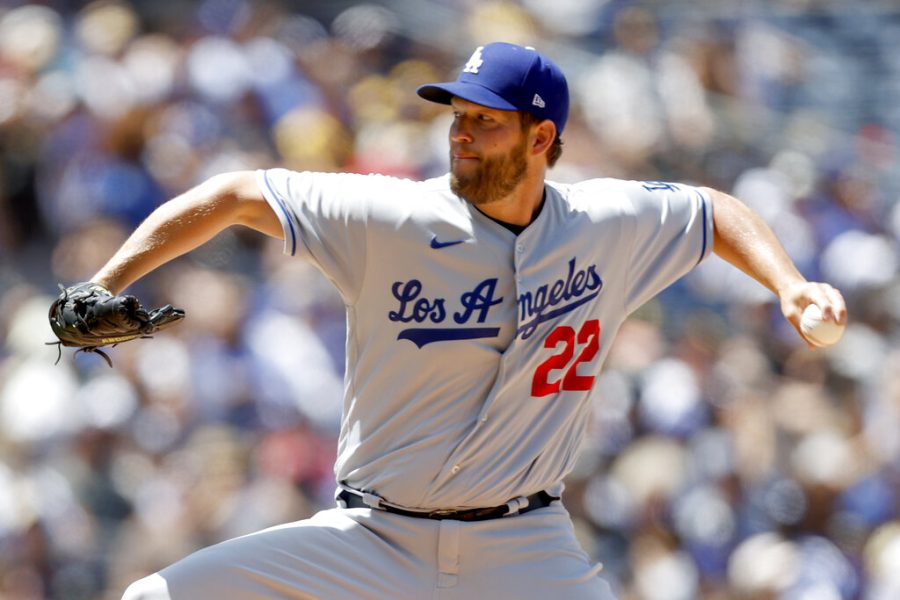 Los Angeles Dodgers Clayton Kershaw pitches against the San Diego Padres during the first inning of a baseball game Sunday, April 24, 2022, in San Diego. (AP Photo/Mike McGinnis)