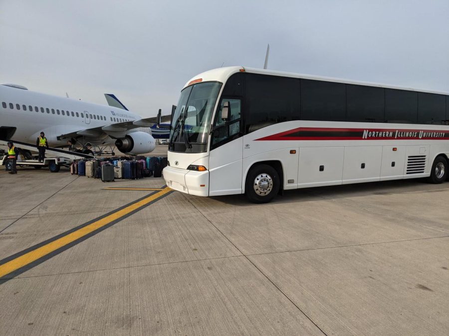 A+Northern+Illinois+University+motorcoach+bus+traveling.+
