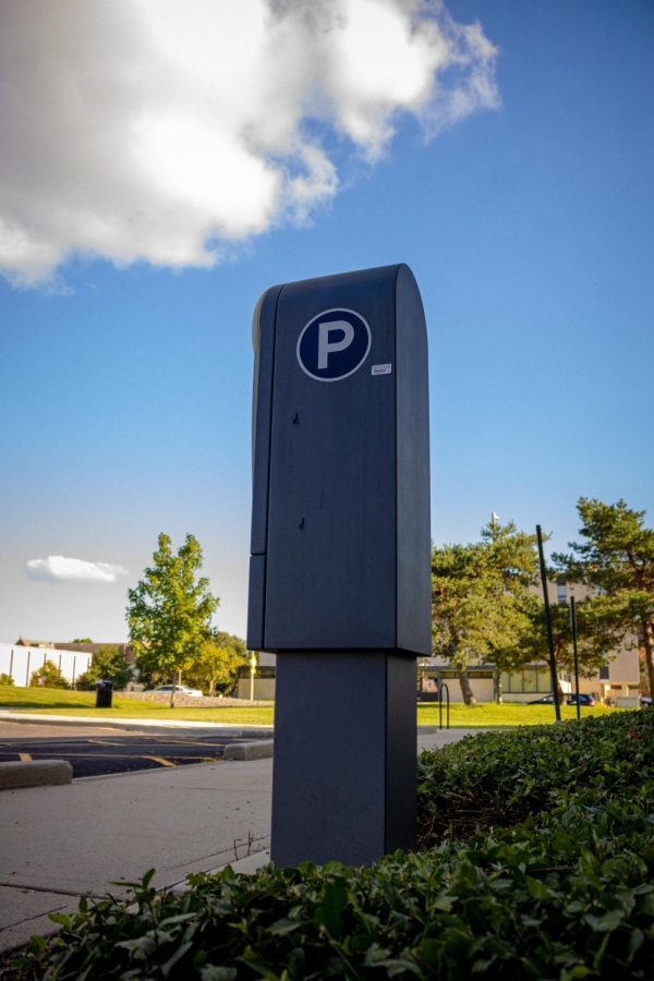 Pay-by-plate parking meter in parking lot five on campus.