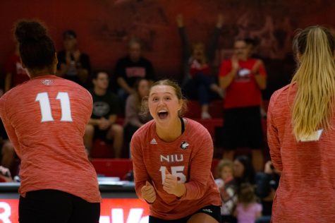 Setter Ella Mihacevich celebrates a point scored in the teams final set vs. South Dakota State on Friday. (Sean Reed | Northern Star)