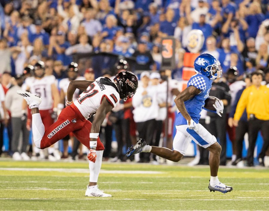 Kentucky freshman wide receiver Barion Brown races past NIU redshirt freshman safety Muhammed Jammeh on a 70-yard catch-and-run touchdown, his second of the game, at the beginning of the third quarter. Brown became the sixth player in the Kentucky Wildcats history to have two touchdown receptions in a game. (Isabel McSwain | Kentucky Kernel)