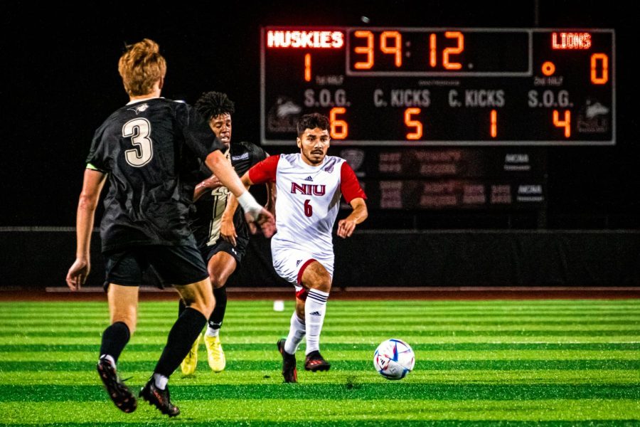 Senior midfielder Luis Hernandez advances the ball downfield in the 50th minute of NIUs Thursday night bout against Lindenwood University. The Huskies earned their second tie of the 2022 season after ending the game 1-1.
