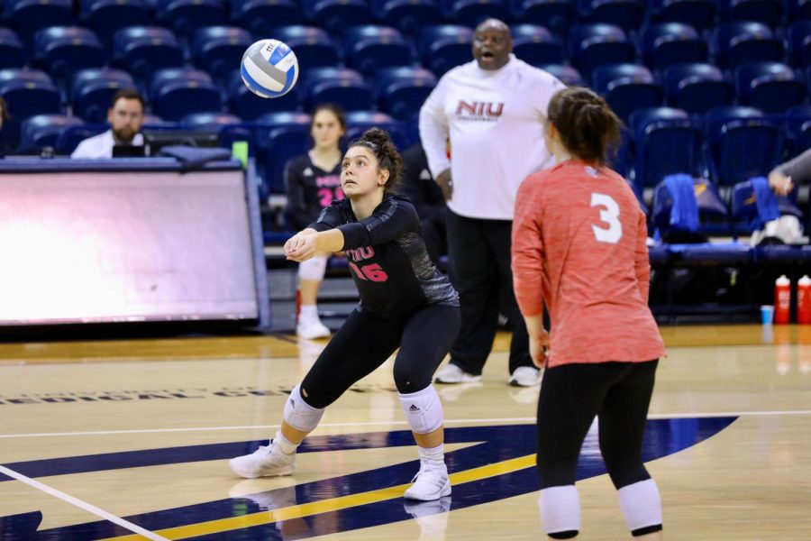 Sophomore setter Sophie Hurt bumps the ball during the first set of NIUs match against the University of Toledo Rockets on Saturday at John L. Savage Arena. NIU lost the opening set but rallied to win in four sets. (Evan Procaccini)