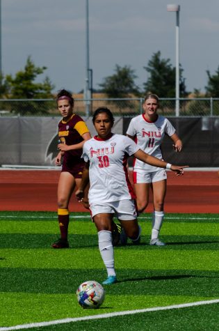 Sophomore forward Edith Delgado kicking the ball during NIUs conference match on Sunday against Central Michigan University. NIU earned its first home win of the season against the Chippewas. (Alyssa Queen | Northern Star)