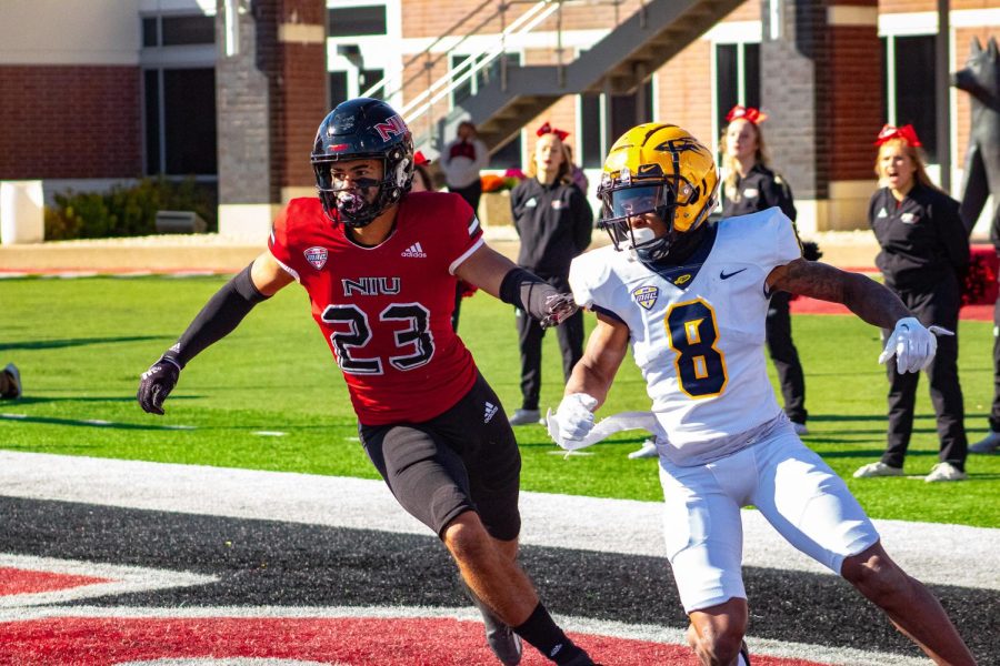 Safety+Jordan+White+%28Left%29+attempting+to+defend+a+score+on+the+Huskies+by+Toledo+junior+wide+receiver+Devin+Maddox+Saturday+at+Huskie+Stadium.+%28Marco+Sotelo+Avila+%7C+Northern+Star%29
