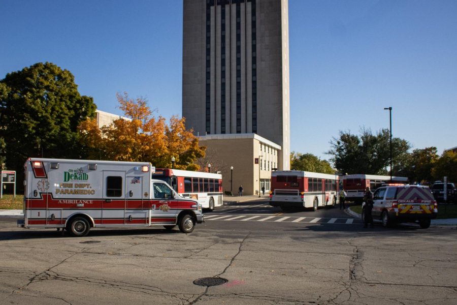 A City of DeKalb ambulance arriving on scene for an incident involving a Huskie Line bus Wednesday evening  off of Lucinda Avenue near the Holmes Student Center. (Sean Reed | Northern Star)