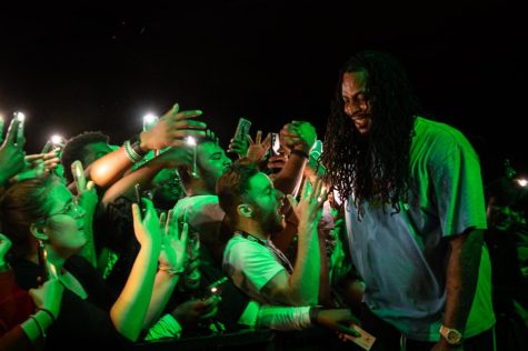 Atlanta-based rapper Waka Flocka Flame performs and interacts with the crowd during NIUs homecoming concert held in the Duke Ellington Ballroom. (Mingda Wu | Northern Star)