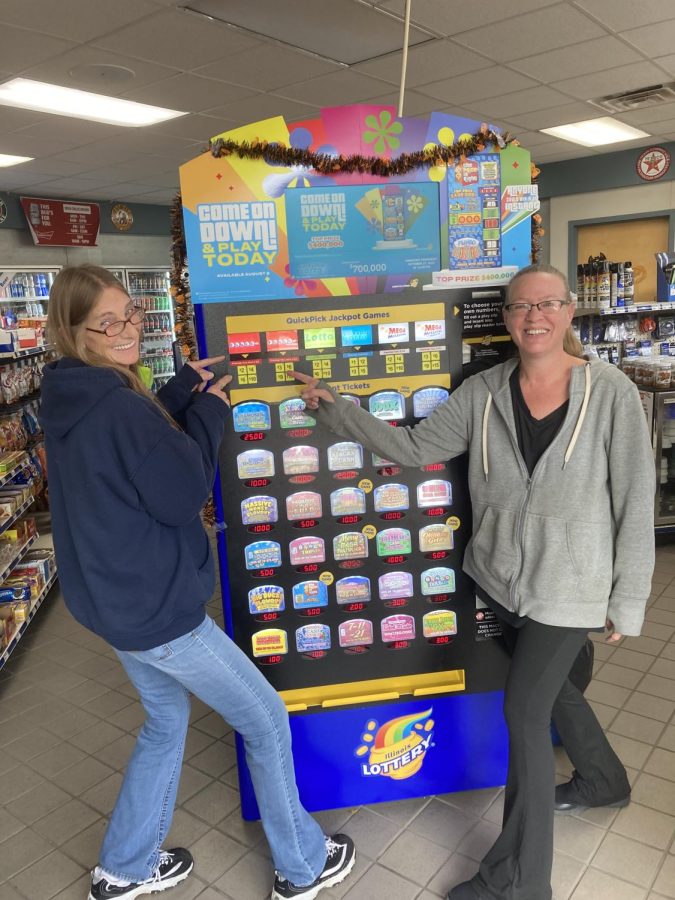 Betsy Byrd (right) and Julie Hurt, employees at Riverside Mobil in Sycamore, after selling a $1 million winning Powerball ticket for the Wednesday, Oct. 26 draw. 