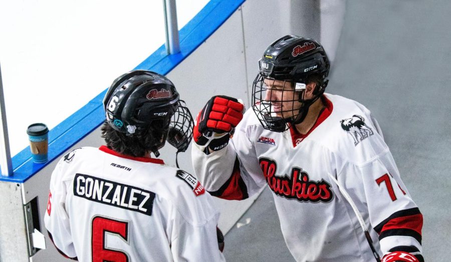 Senior+forward+Nick+Gonzalez+%28left%29+and+senior+defenseman+Alec+Porzondek+greet+each+other+before+NIU%E2%80%99s+first+game+of+its+series+against+Midland+University+on+Oct.+14+at+Canlan+Ice+Sports+in+West+Dundee.+The+team+plans+to+use+its+team-building+opportunities+from+last+weekend%E2%80%99s+road+trip+against+the+University+of+Jamestown+to+help+the+Huskies+get+their+first+win+of+2022+against+Waldorf+University+this+weekend.+%28Beverly+Buchinger+%7C+NIU+Hockey%29