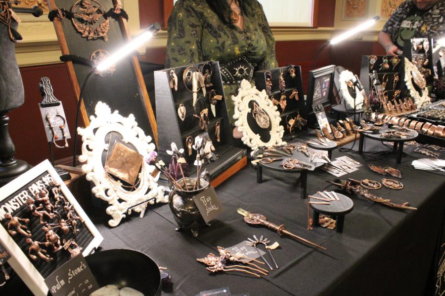 Kimberly Walker, a Belvidere resident and owner of Bast and Baetyl Alchemy held a table at the Dark Art and Oddities Con over the weekend. (Nyla Owens | Northern Star)