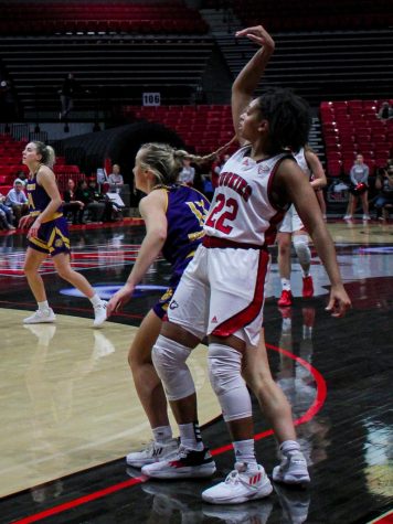 NIU graduate guard Janae Poisson shoots a three-pointer during the middle of the second period against the Western Illinois University Leathernecks at the Convocation Center. (Nyla Owens | Northern Star)