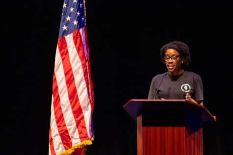 U.S. Representative Lauren Underwood telling the crowd why voting matters in contemporary elections on Tuesday. (Sean Reed | Northern Star)