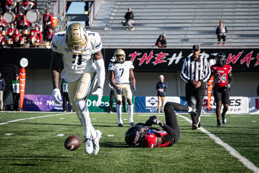University of Akron redshirt junior wide receiver Daniel George fails to make a catch against NIU redshirt freshman safety Devin Lafayette early in the second quarter during the game on Saturday.