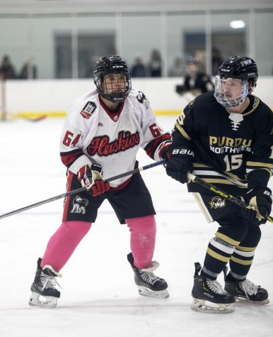 NIU freshman forward Cam Pathana (64) pressures a Purdue University Northwest player during a game on Oct. 14 at Canlan Ice Sports in West Dundee. (Beverly Buchinger | NIU Hockey)