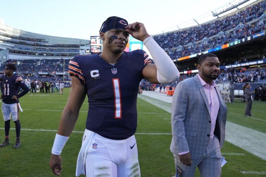 Chicago Bears quarterback Justin Fields walks off the field after the Miami Dolphins beat the Bears 35-32 in an NFL football game, Sunday, Nov. 6, 2022 in Chicago. (AP Photo/Nam Y. Huh)
