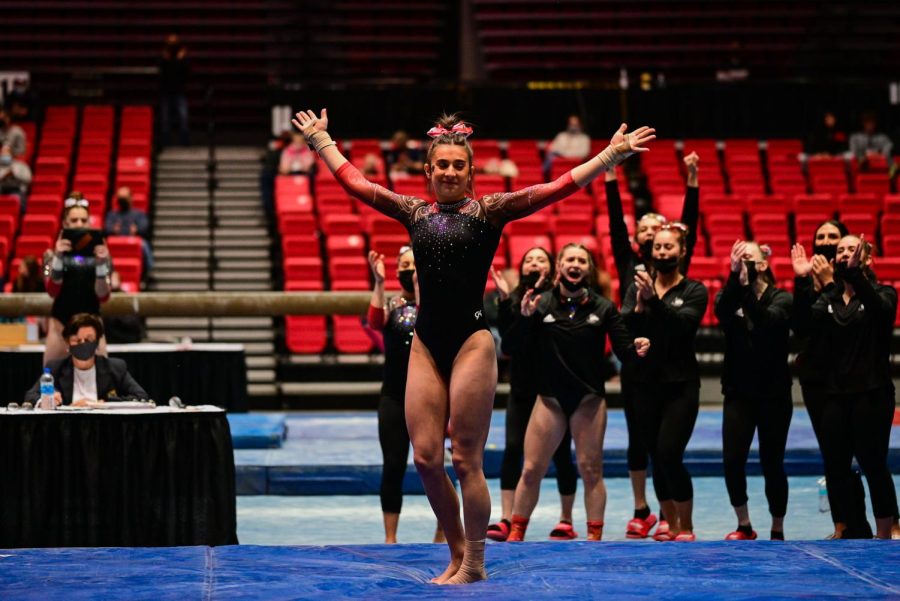 Then-freshman gymnast Isabella Sissi salutes after completing an attempt on vault during NIUs home meet against Illinois State University on Feb. 13, 2021.