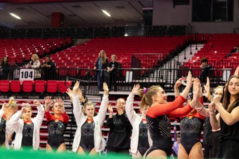 NIU junior Olivia Lynd competing in the floor event during the NIU Tri Meet, facing Illinois State and Winona State on Sunday at the NIU Convocation Center. (Cheyanne Quintanilla | Northern Star)