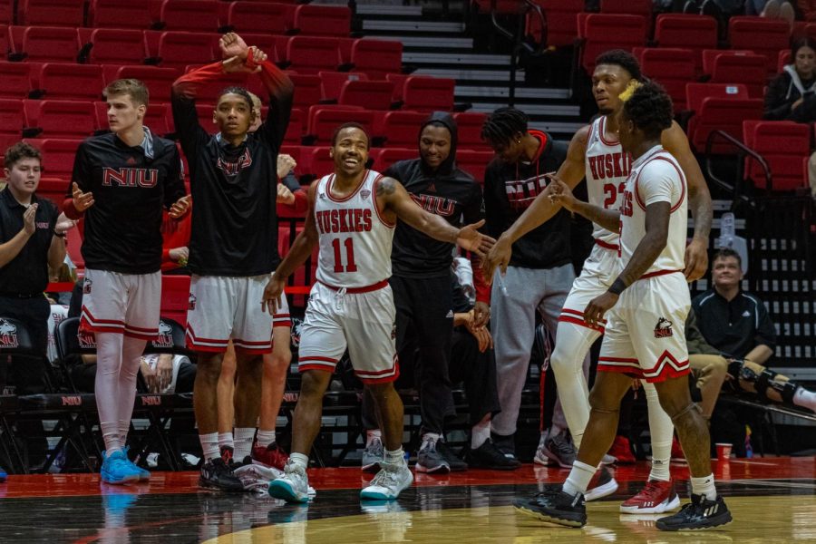 NIU sophomore guard David Coit celebrates during the Huskies 73-54 victory over Central Michigan University on Tuesday at the NIU Convocation Center. (Sean Reed | Northern Star)
