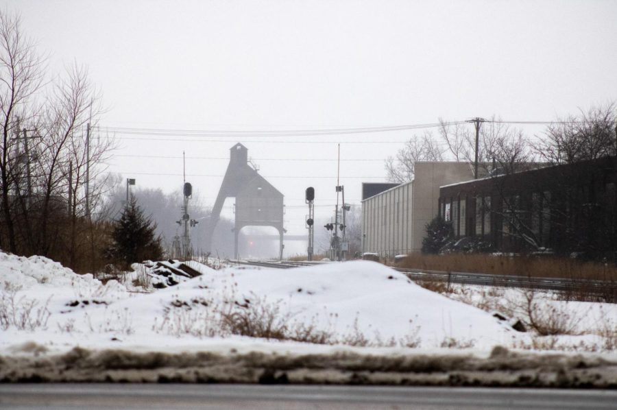 A view of the Union Pacific owned train tracks looking southwest from the currently out-of-service DeKalb train station parking lot at the corner of East Locust Street and North 6th Street in downtown DeKalb. (Tim Dodge | Northern Star)