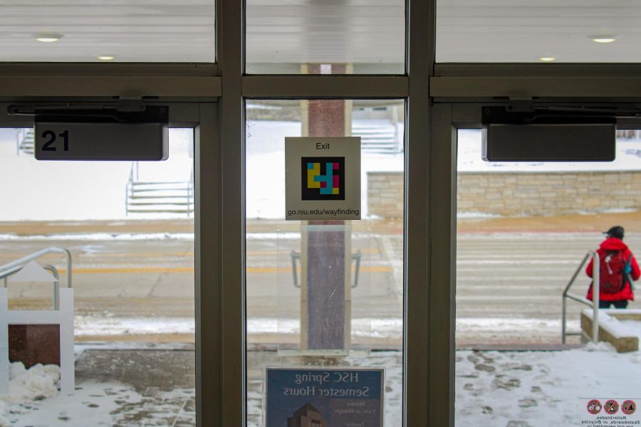A NaviLens accessible wayfinding QR code on a door at the Normal Road entrance of
Holmes Student Center. (Nyla Owens | Northern Star)