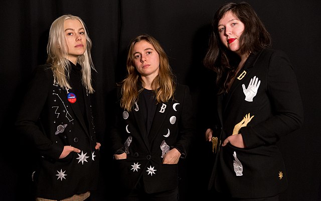 The three members of boygenius (from left) Phoebe Bridgers, Julien Baker and Lucy Dacus standing at a photoshoot in 2018.