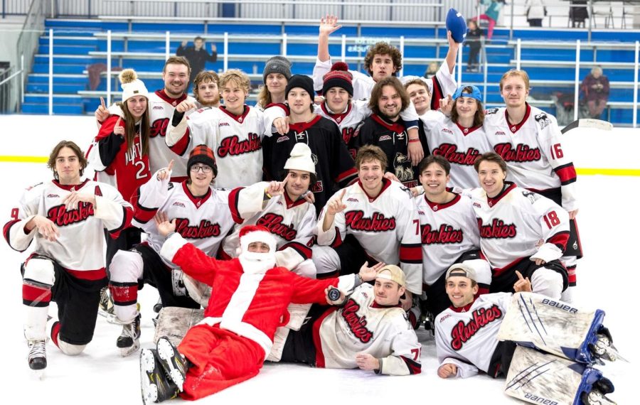 NIU+hockey+poses+with+Santa+during+a+postgame+skate+with+the+team+after+its+5-3+win+over+McKendree+University+on+Dec.+3.+%28Photo+courtesy+of+NIU+hockey%29