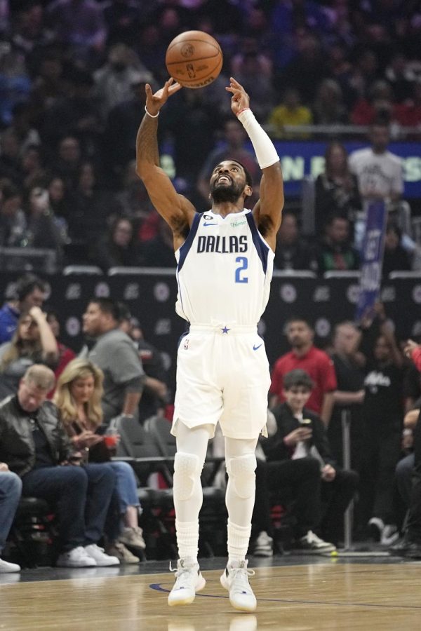 Dallas+Mavericks+guard+Kyrie+Irving+tosses+the+ball+in+the+air+just+prior+to+tip-off+in+an+NBA+basketball+game+against+the+Los+Angeles+Clippers+Wednesday%2C+Feb.+8%2C+2023%2C+in+Los+Angeles.+%28AP+Photo%2FMark+J.+Terrill%29