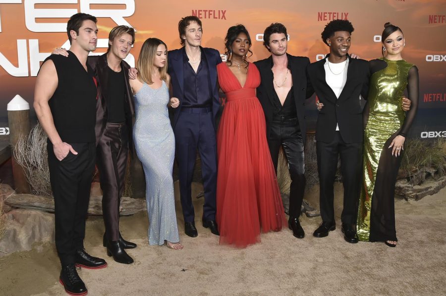 The cast of Outer Banks, Rudy Pankow, Madelyn Cline, Drew Starkey, Carlacia Grant, Chase Stokes, Jonathan Davis and Madison Bailey at the season three premiere in Los Angeles.