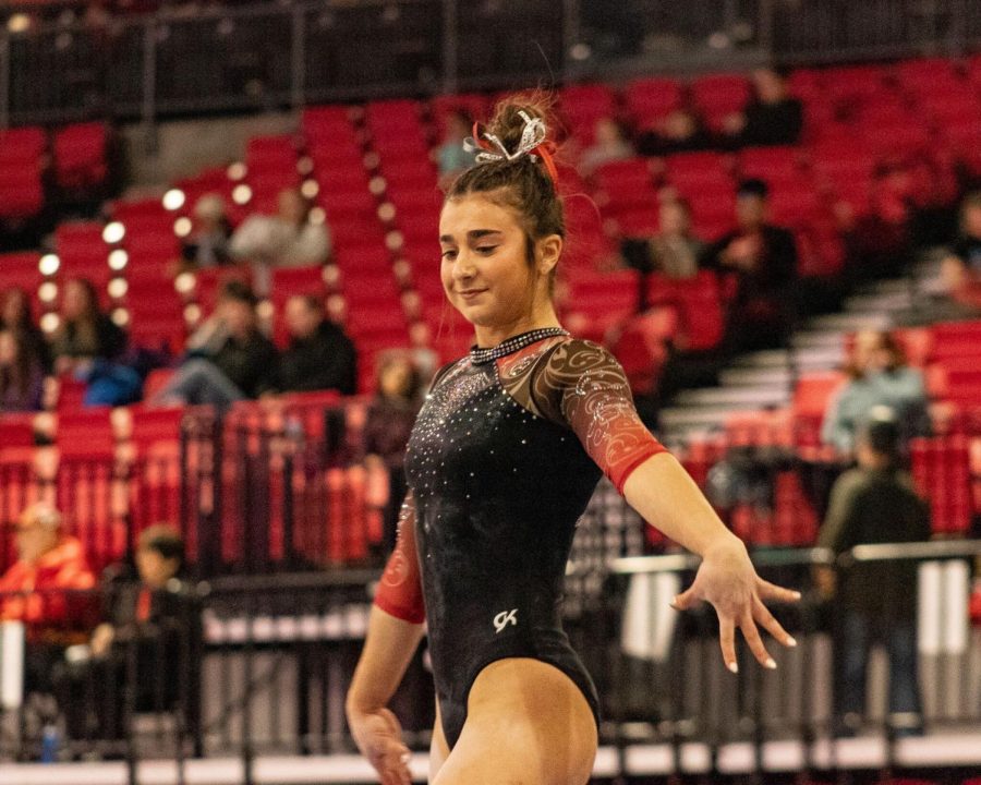 NIU+sophomore+gymnast+Isabella+Sissi+completes+her+floor+performance+on+Saturday+at+the+Huskies%E2%80%99+Beauty+and+the+Beast+meet+at+the+NIU+Convocation+Center.+Sissi+earned+9.875+points+for+her+floor+routine+and+second+place+all-around+for+the+meet.+%28Cheyanne+Quintanilla+%7C+Northern+Star%29