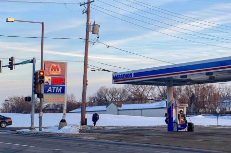 The Marathon gas station with a sign displaying the price of regular gasoline at $3.89 per gallon on Monday evening on Lincoln Highway. (Sean Reed | Northern Star)