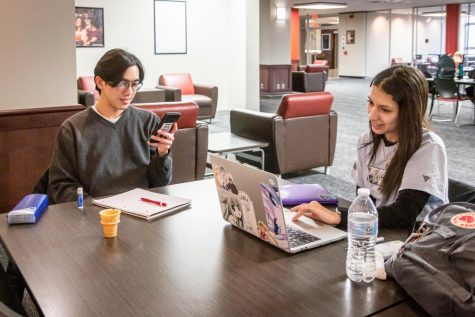 Mirella Duron (right), a junior anthropology major, and Dylan Ruan (left), junior applied mathematics major, studying on Thursday afternoon on the second floor of the Student Center. (Mingda Wu | Northern Star)