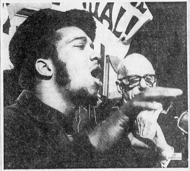 Fred Hampton giving a speech during protest outside of a courthouse in Chicago.  