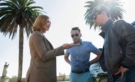 Actors Sarah Snook, Kieran Culkin and Jeremy Strong from Succession talking itno a phone. The shows fourth and final season premiered Sunday. 
