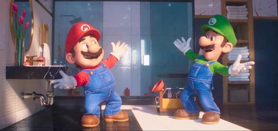 Mario and Luigi from The Super Mario Bros. Movie reaching towards each other, prepared to hug. The film came out April 5, and fans of the game have been enjoying it. (Nintendo and Universal Studios via AP)