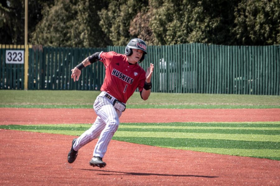 NIU+junior+shortstop+Andre+Demetral+%281%29+rounds+to+third+base+after+stealing+second+base+in+the+bottom+of+the+first+inning.+Demetral+scored+off+of+a+hit+by+junior+first+baseman+Colin+Summerhill%2C+earning+the+Huskies+their+first+run+of+the+game+and+setting+the+score+3-1.+%28Mingda+Wu+%7C+Northern+Star%29