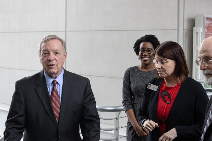 (From left) Sen. Dick Durbin, Rep. Lauren Underwood and NIU President Lisa Freeman begin their tour of the clean room lab Wednesday on the second floor of the NIU College of Engineering and Engineering Technology. Underwood previously visited the lab on Jan. 20 after she secured a grant for NIU, one of the 15 projects selected for Community Projects Funding in May 2022. (Sean Reed | Northern Star)