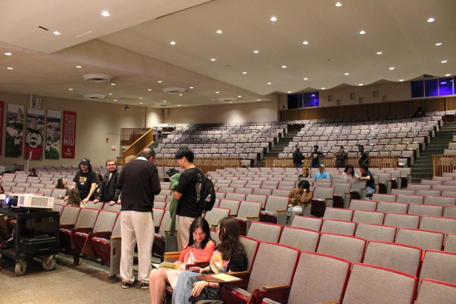 Students await in the Carl Sandburg auditorium for night two of the Reality Bytes Film Festival. The film festival is an annual event at NIU. (Nyla Owens | Northern Star)