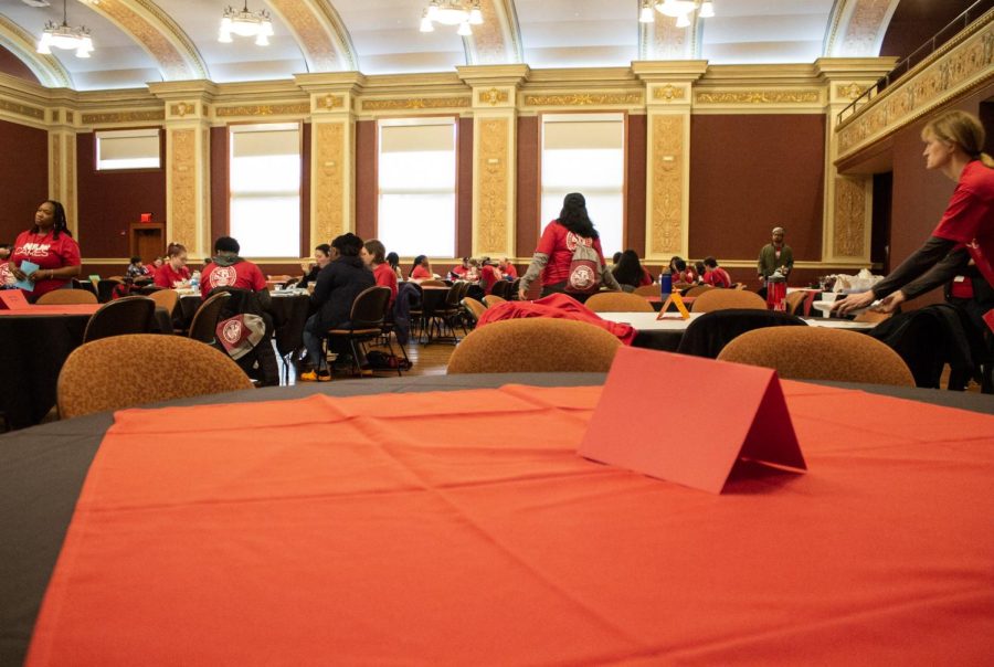 A table sits empty during breakfast in the auditorium of Altgeld Hall before volunteers head to their locations around 10:30 a.m. (Madelaine Vikse | Northern Star)