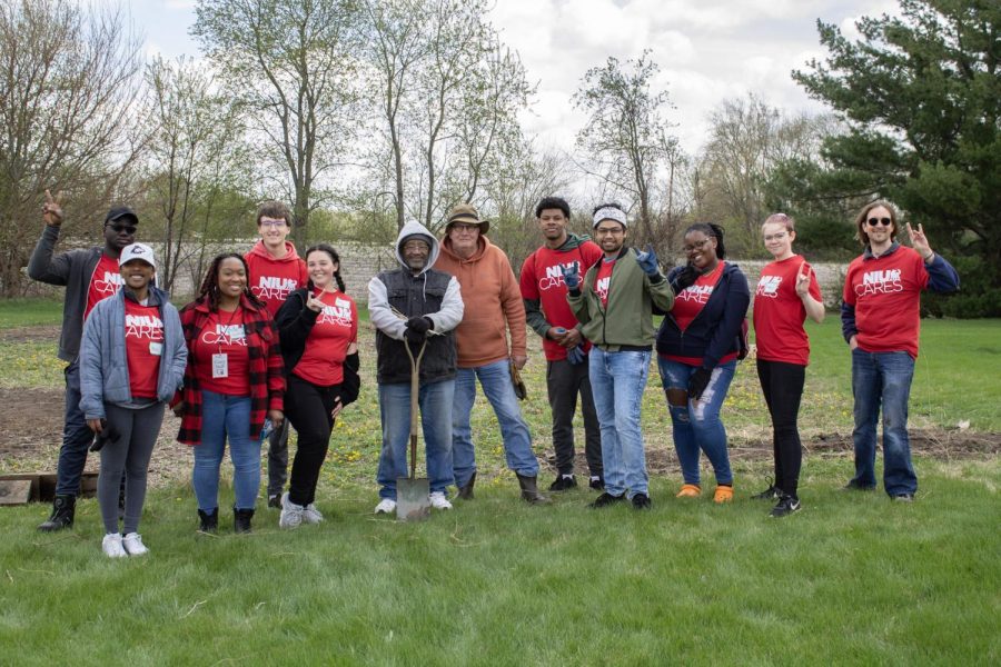 NIU Cares day of service volunteers pose for a photo Friday at the New Hope Missionary Baptist Church. At this location, volunteers were to help plant and clean the church’s garden on Friday during NIU Cares. (Madelaine Vikse | Northern Star)