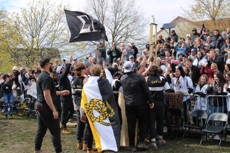 Reigning Tugs champions Sigma Nu celebrate defeating Phi Sigma Kappa on Saturday. Sigma Nu is the 2023 Tug Champion, making this its third consecutive win. (Nyla Owens | Northern Star) 