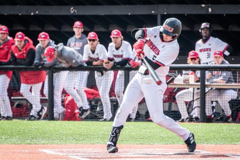 Then-junior infielder Eric Erato swings at a pitch against the University of Illinois Chicago on April 25, 2023. Erato went 3-for-5 in NIU baseballs 6-1 victory over Ohio University on Sunday. (Mingda Wu | Northern Star)