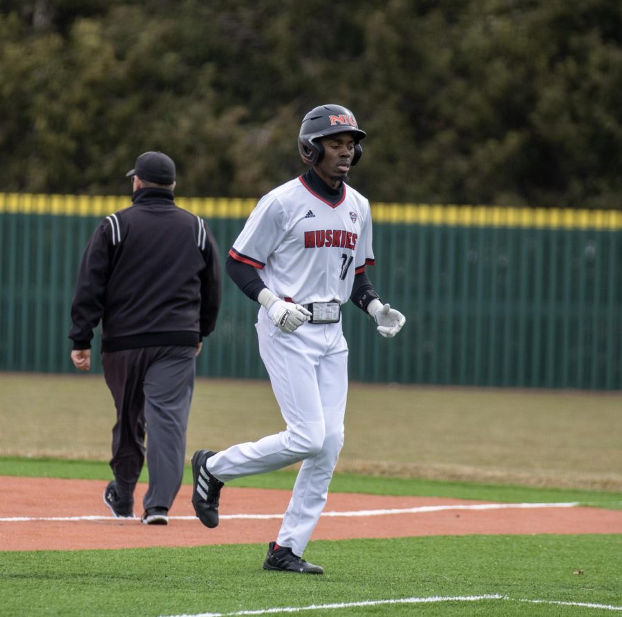 Senior outfielder Malik Peters jogs to the dugout during NIU baseballs home opener against Ohio on March 24. The Huskies lost the game  11-2. (Tim Dodge | Northern Star)
