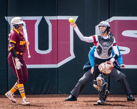 NIU catcher Ellis Erickson (23) tosses the ball to the pitcher as CMU batters switch out. (Mingda Wu | Northern Star)