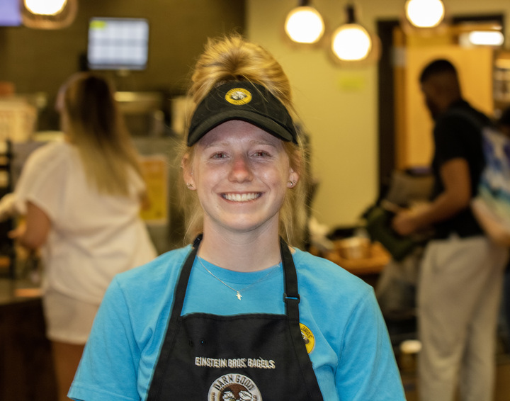 Zoe Hougas, a freshmen nursing major, at Einstein Bros. Bagels in the founders memorial library. (Tim Dodge | Northern Star)