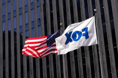 File - The American and FOX flags fly outside the News Corp. and Fox News headquarters on  April 19, in New York. Fox Corp.s hefty $787.5 million settlement with Dominion over defamation charges is unlikely to make a dent in Foxs operations, analysts say. (AP Photo/Mary Altaffer, File)