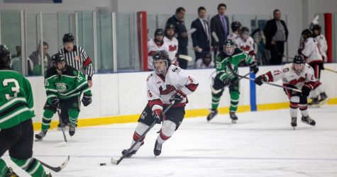 Senior forward Nick Gonzalez rushes the puck into the offensive zone in NIU hockeys 3-2 win over Roosevelt University on Jan. 7. (Photo courtesy of NIU hockey)