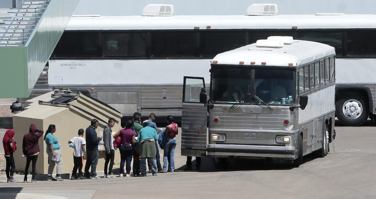 Migrants are loaded onto a bus at the Border Patrol headquarters on Hondo Pass, in El Paso, Texas. Officials say Illinois will provide for a funeral and burial for Jismary Alejandra Barboza González, the three-year-old migrant girl who died Aug. 10 on a bus headed to Chicago from Texas. (Mark Lambie/The El Paso Times via AP, File)